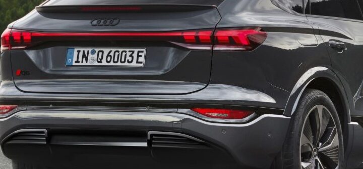 A close-up of the rear lighting system of the Audi Q6 e-tron which integrates six digital rear Atala OLED 2.0 panels, featuring 360 individually addressable, software-controlled segments.