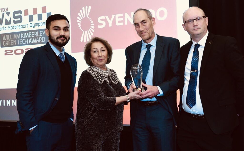 Gaurav Unni, Global Sales Leader Automotive Composites; Mark Steele, Automotive Customer Engineering Manager; and Mark Harriman, Head of Emerging Markets & Technology R&I, receive the Green Tech Award for Syensqo’s bio-based MTM 49-3.