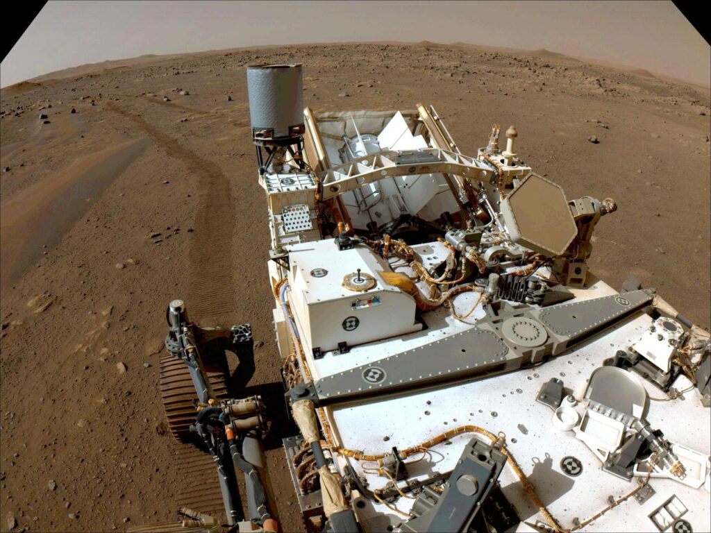 NASA's Perseverance Mars rover looks back toward its tracks on July 1, 2021 (the 130th sol, or Martian day, of its mission), after driving autonomously 358 feet (109 meters).